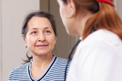 Woman in conversation with her doctor