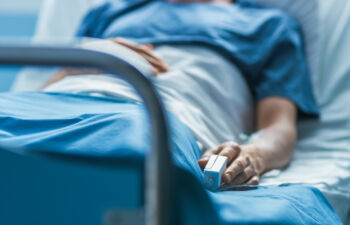 Patient in hospital bed