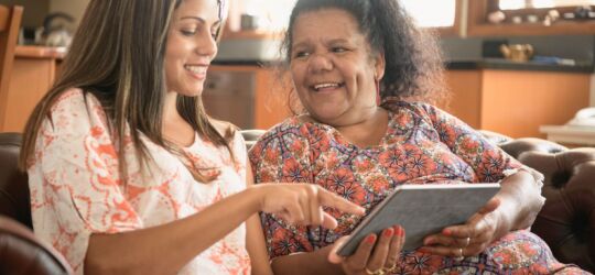 Getty Images-911034664-Aboriginal-women-using-tablet-resize