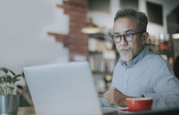 Getty Images-1266563478-man-on-laptop-resized