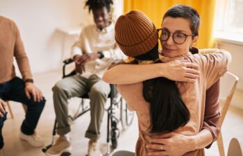 Getty Images-1320910671-support-group-resize