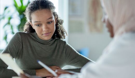 Getty Images-1350731630-young-person-with-doctor-cropped