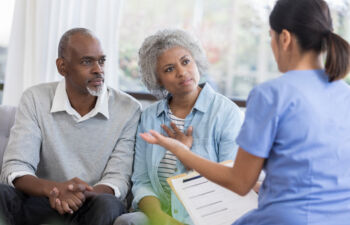 Doctor with senior couple