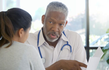 Doctor and patient talking
