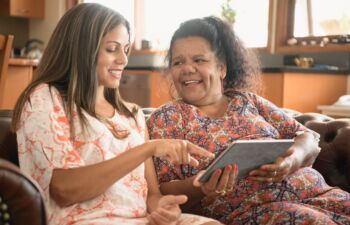 Getty Images-911034664-Aboriginal-women-using-tablet-resize